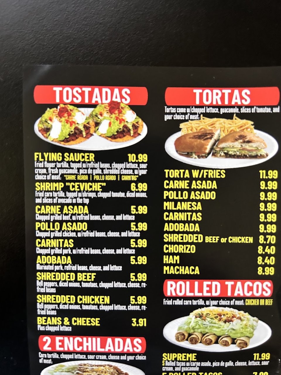Printed menu with breakfast burritos and plates.