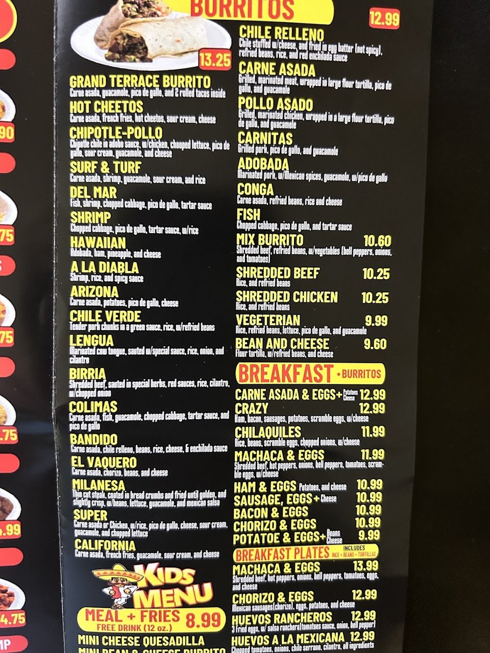 Menu board listing breakfast and lunch favorites.